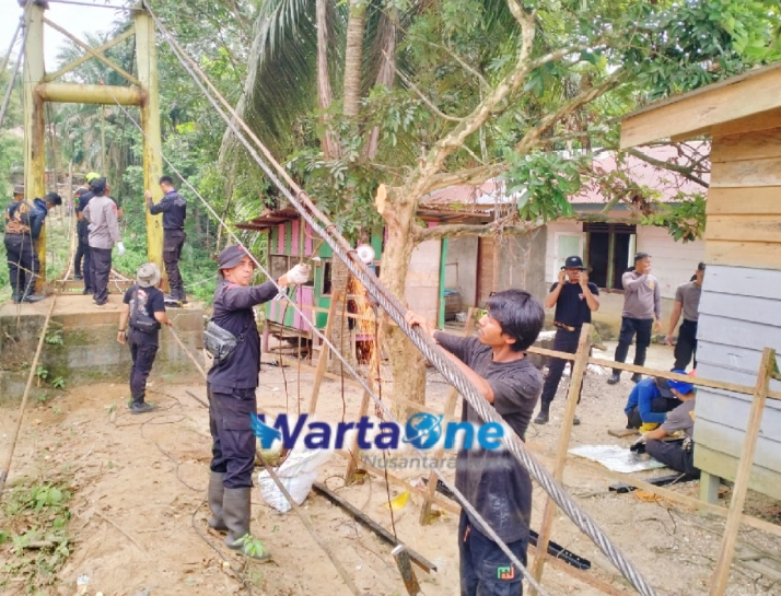Wujudkan Mimpi Anak Sekolah, Polda Riau Kebut Jembatan Gantung di Kuansing